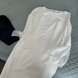 Chic White Dress with Sheer Sleeves